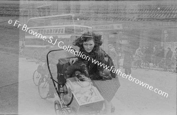 CHILD WITH DOLL'S PRAM